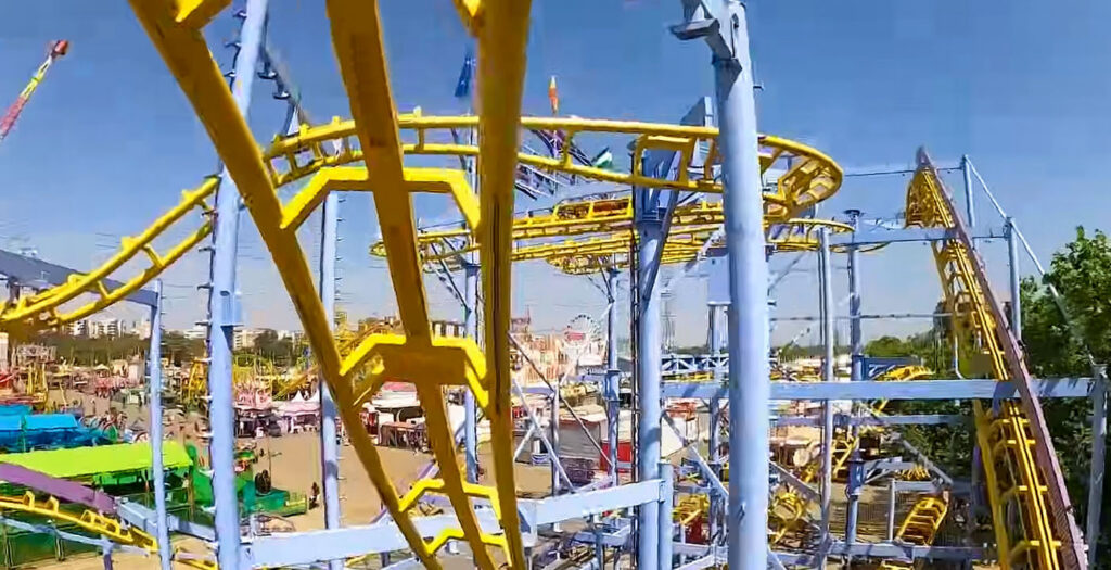 Kirmes Sevilla: Achterbahnwagen teilweise entgleist